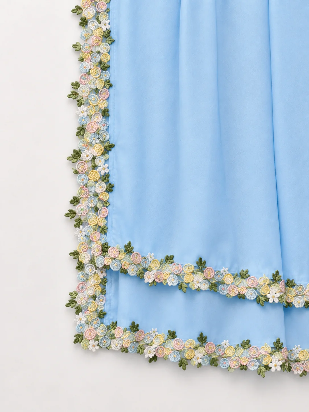 Floral Trim shown as a finished hijab, hanging